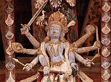 Kathmandu Changu Narayan 09 A Multi Armed Tantric Deity Carved In Wood On The Roof Strut Of Changu Narayan Temple The double-roofed Changu Narayan Temple in the Kathmandu Valley has intricate roof struts with multi-armed Tantric deities, masterpieces of Newari carving.